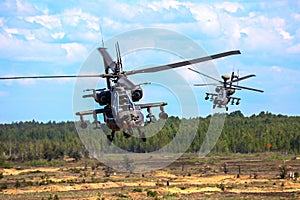 Fighting helicopter in military training Saber Strike in Latvia. photo